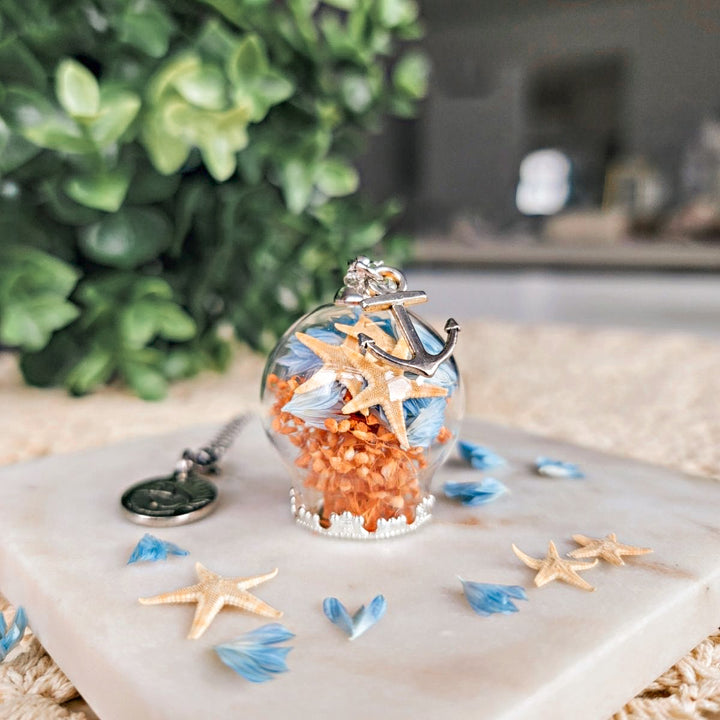 Bijoux symbolique floral fait de vraies fleurs séchées avec étoile de mer et une breloque ancre à bateau en acier inoxydable